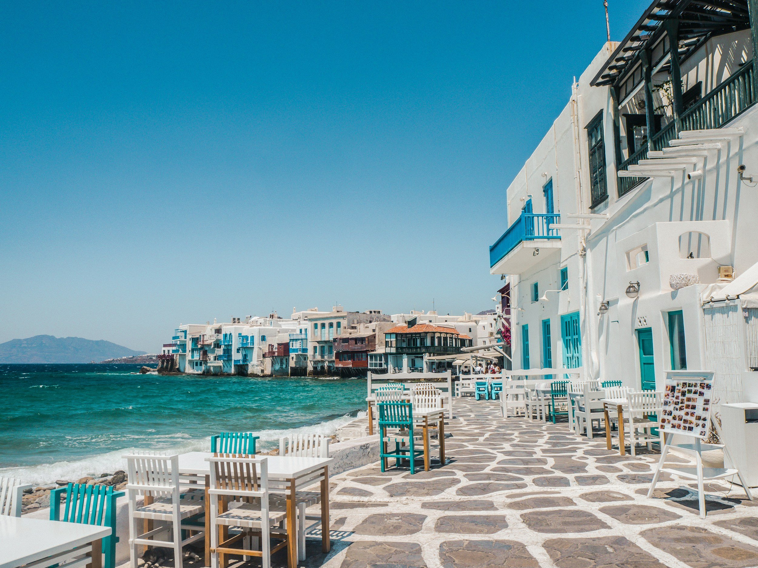 Whitewashed houses and narrow streets in an old Athens neighborhood below the Acropolis