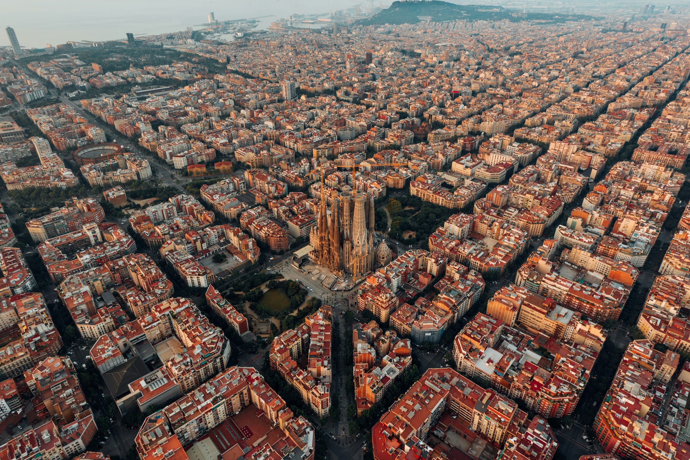 Antoni Gaudi's ornate Sagrada Familia rising above the rooftops of Barcelona