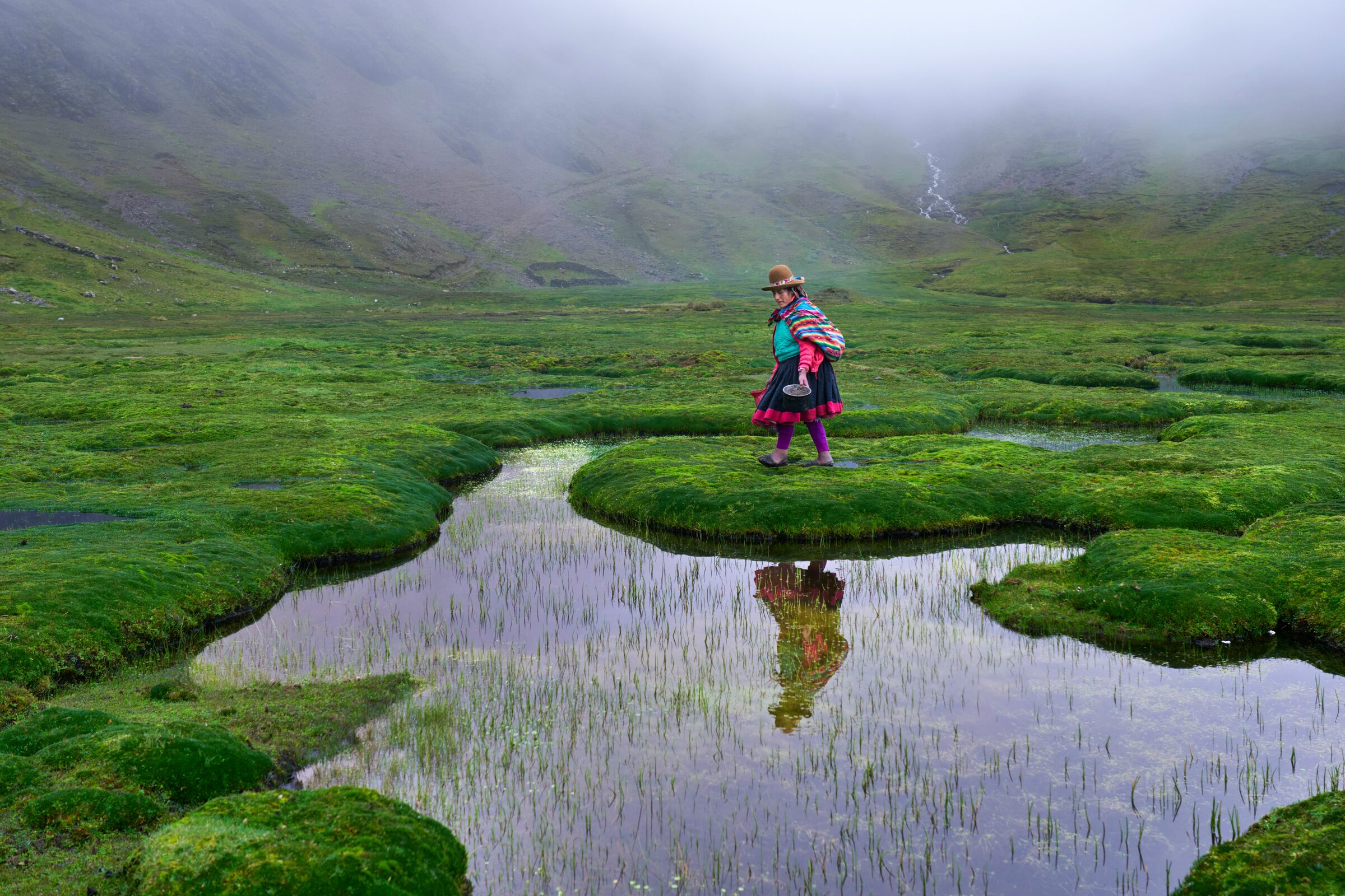 The ancient stone terraces of Machu Picchu among the Andes mountains in Peru