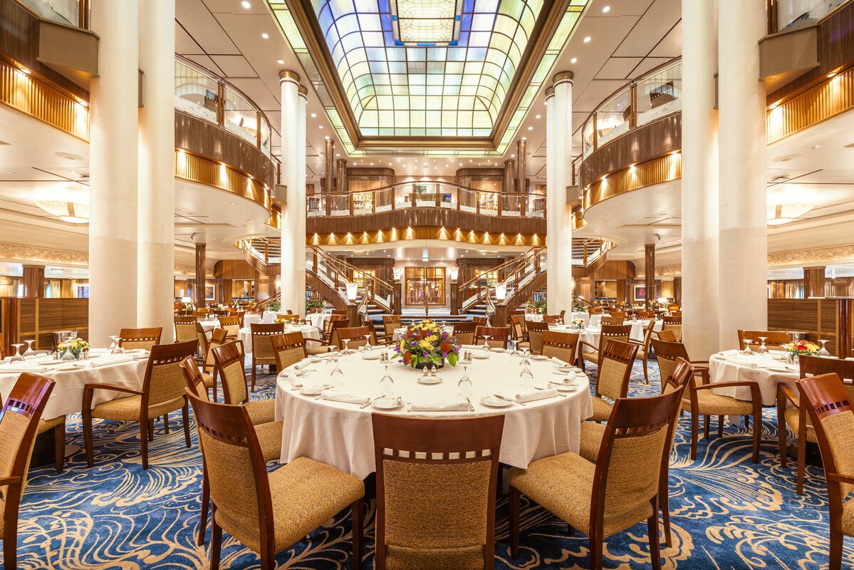 Queen Mary 2 Britannia Restaurant — the formal-dining register that defines a Cunard sailing.